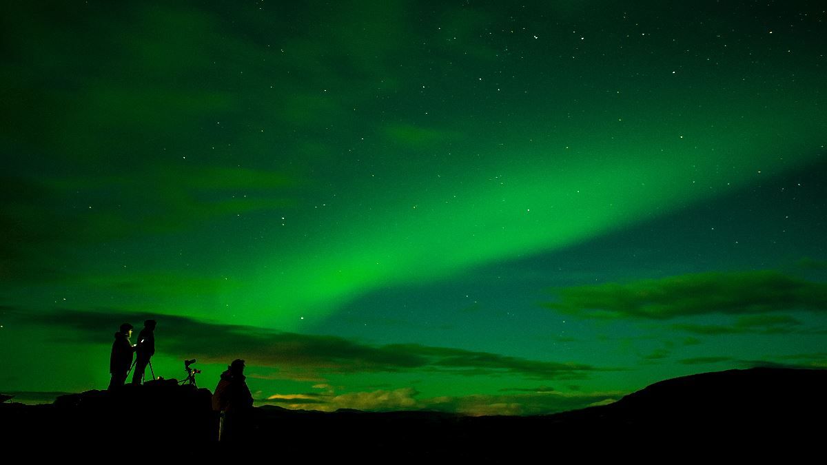 A group enjoying the northern lights