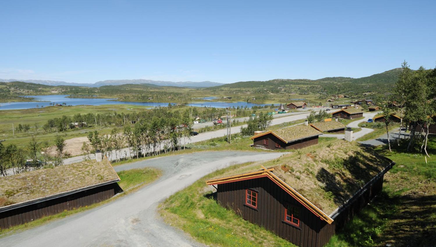 The cabins from Vierli Hyttegrend with a view of the beautiful landscape on Rauland