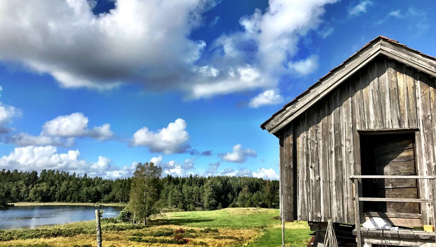 an old farmhouse by the water