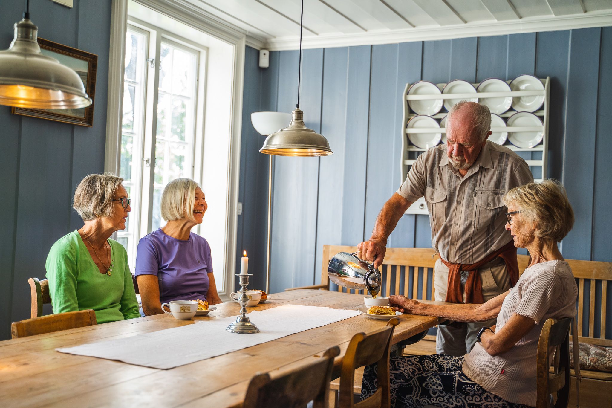 a group of people enjoing coffee