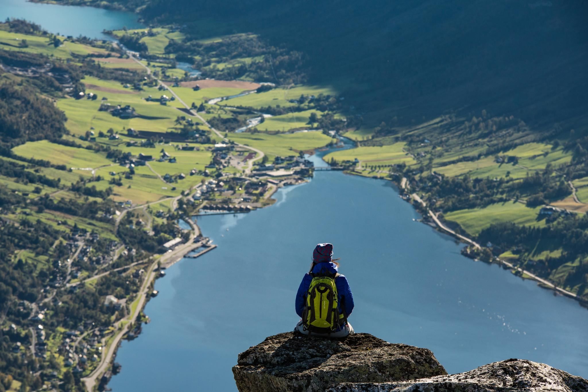 View from Hoven towards Nordfjord, with the fjord, mountains and settlements visible below.