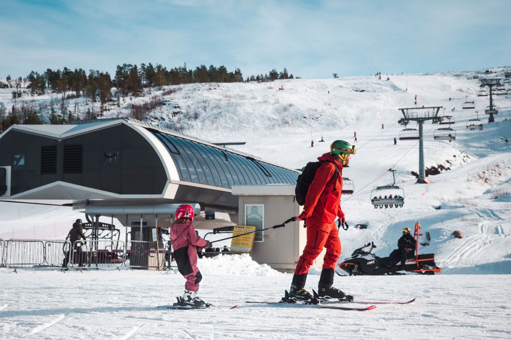 mann and child at Gautefall ski center 