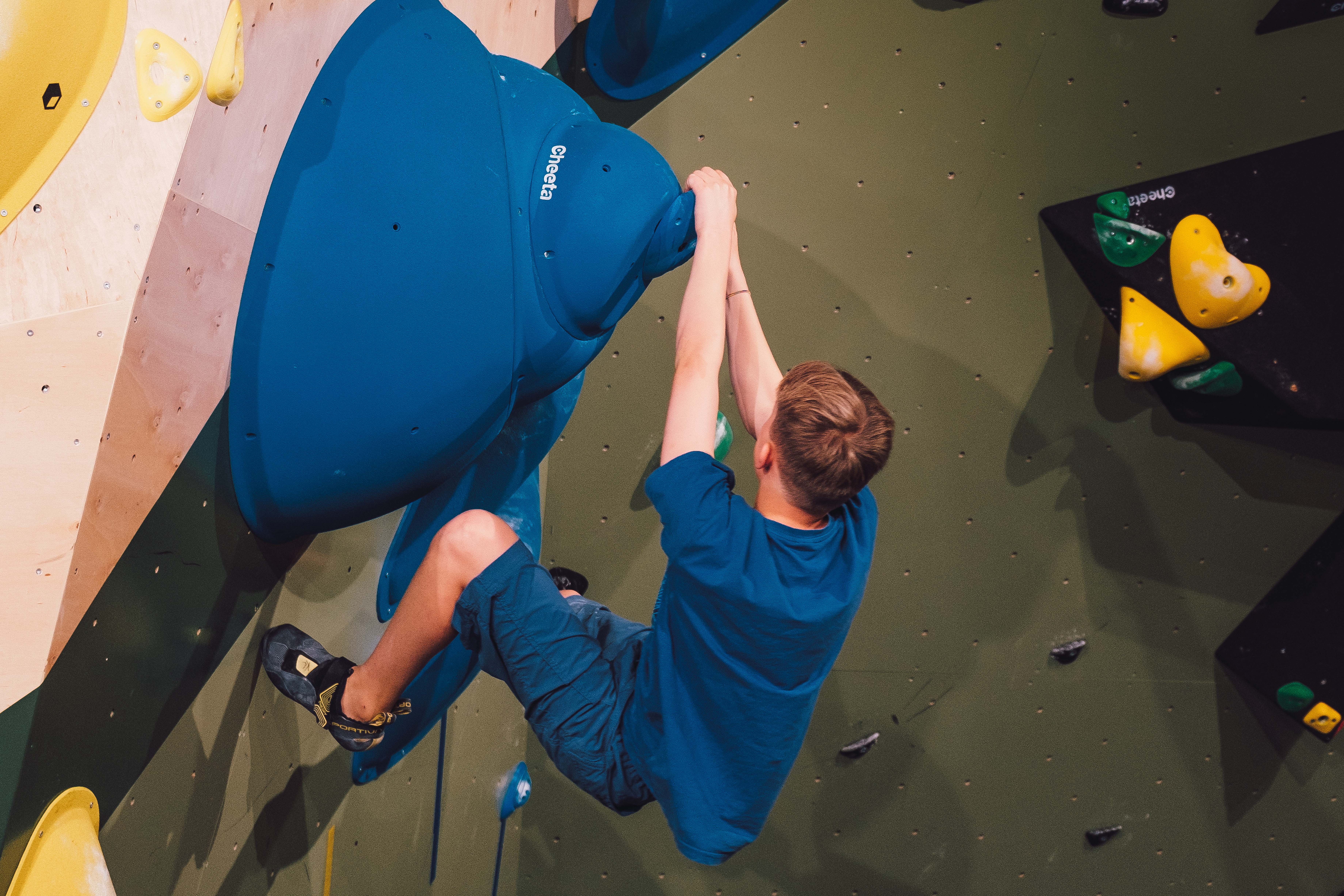 Boy in climbing wall
