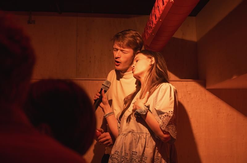 people singing karaoke