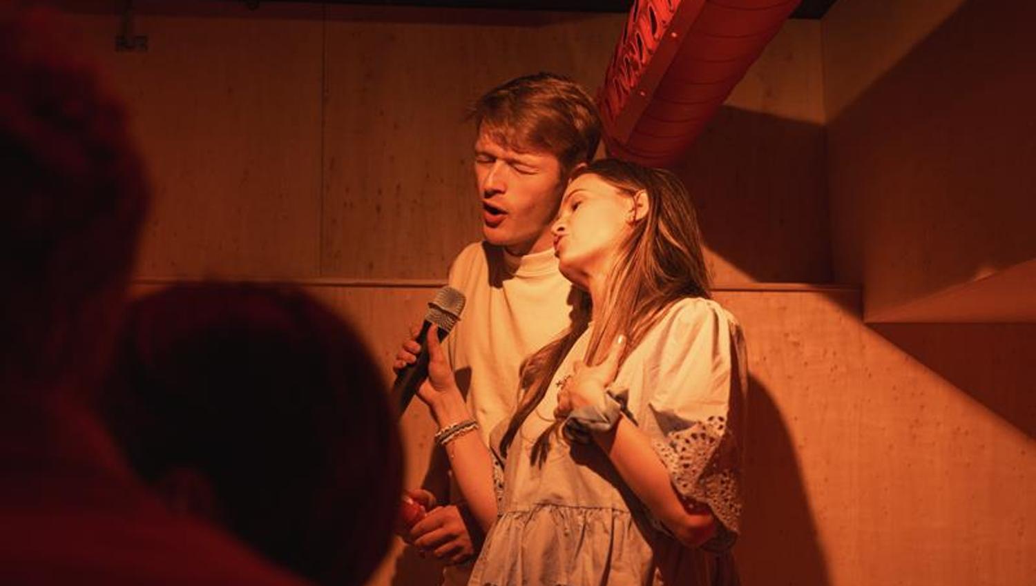 people singing karaoke