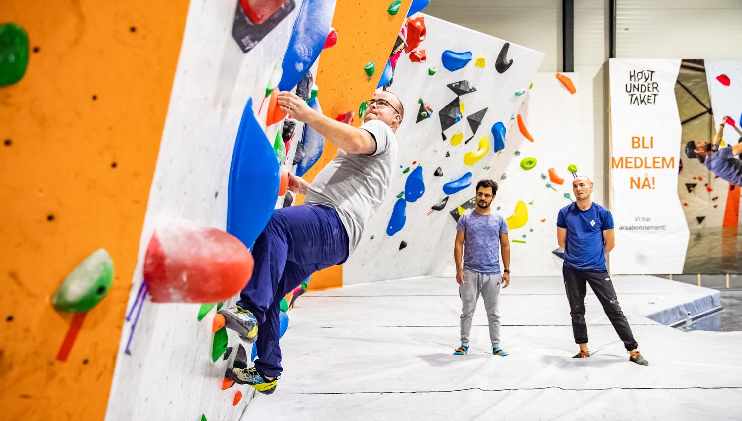 People climb in the bouldering room