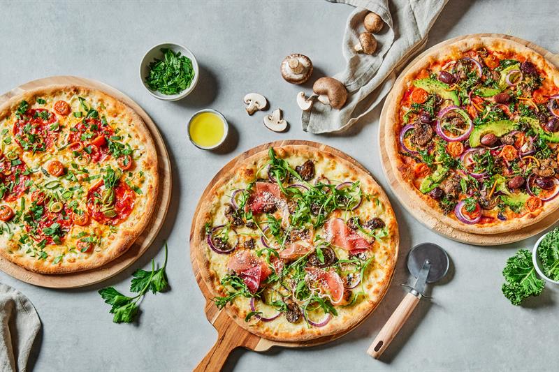 Detaljbilde av vegetarpizzaer.