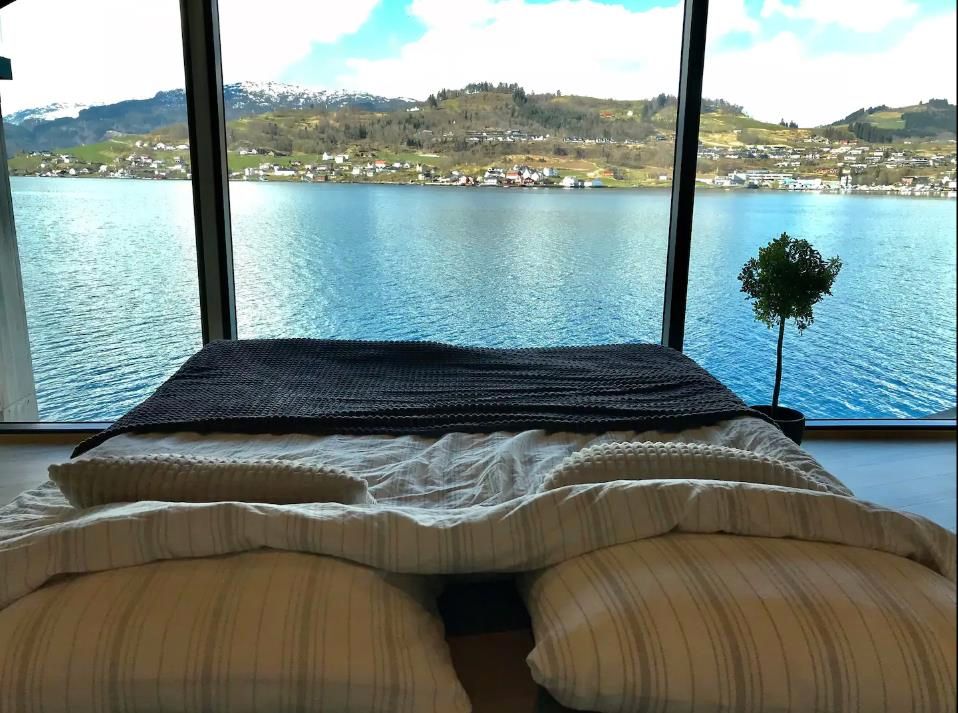Wake up to a stunning view of the Hardangerfjord right from your bed.