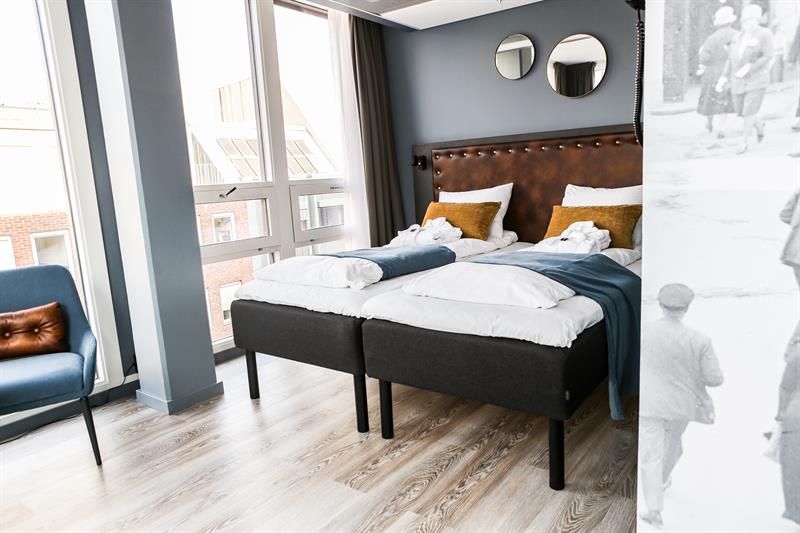 twin bed in one of the rooms