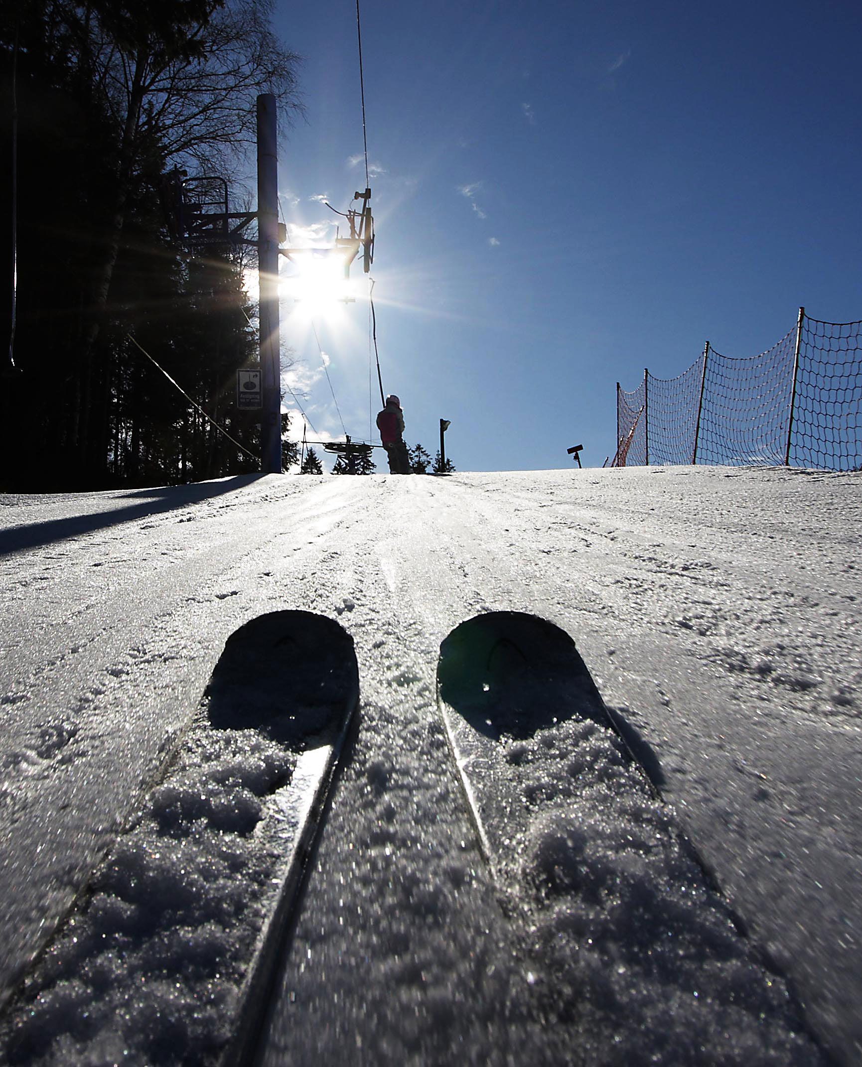 skis on the slopes, perfect snow conditions and sunshine