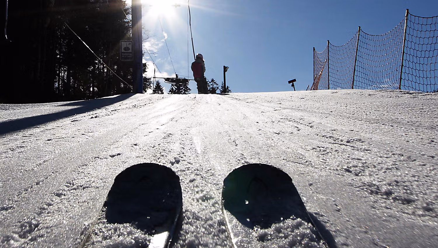 skis on the slopes, perfect snow conditions and sunshine