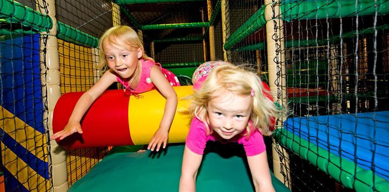 Children have fun ar the playground.