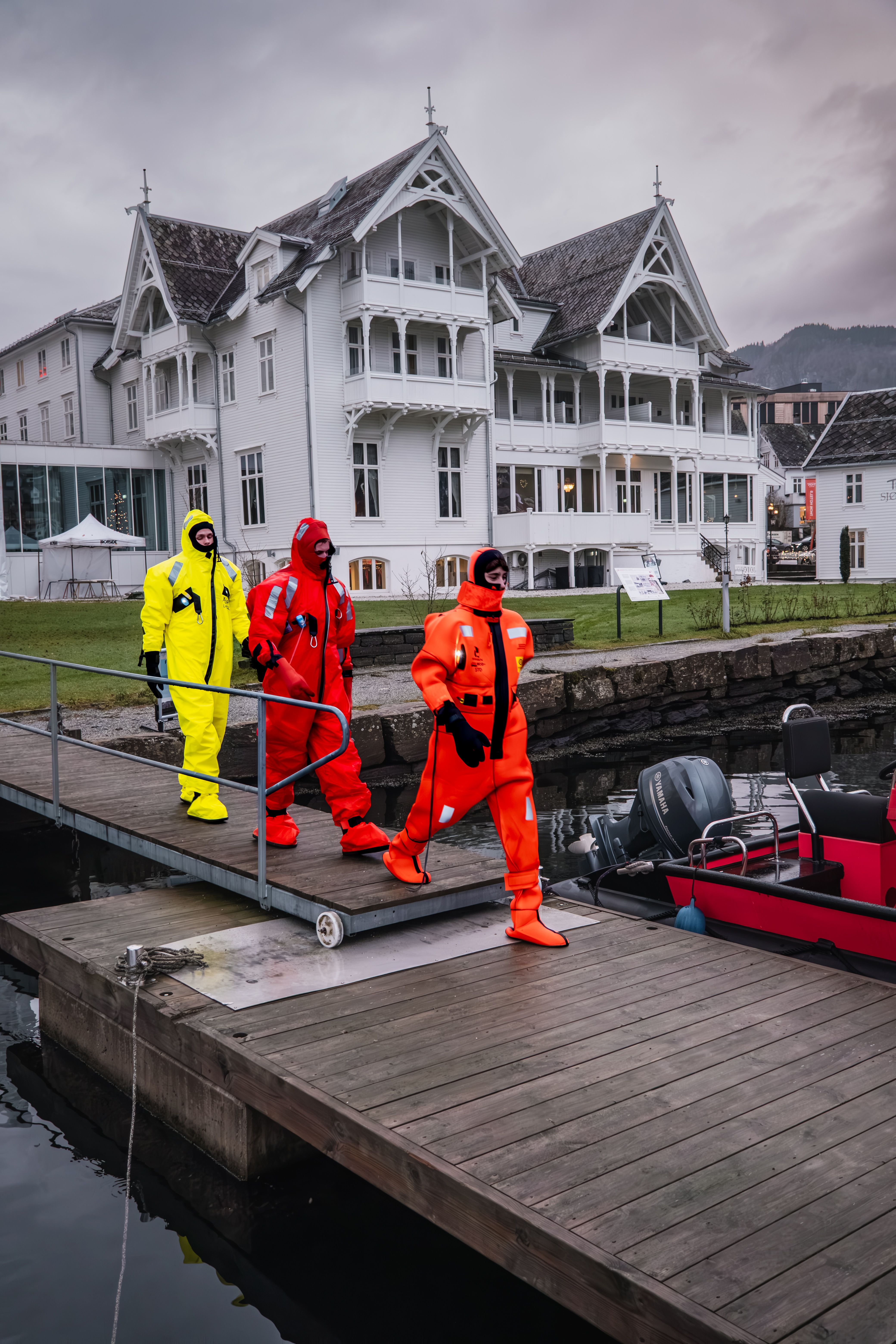 People in their way to the shore during Fjord floating in the Hardangerfjord