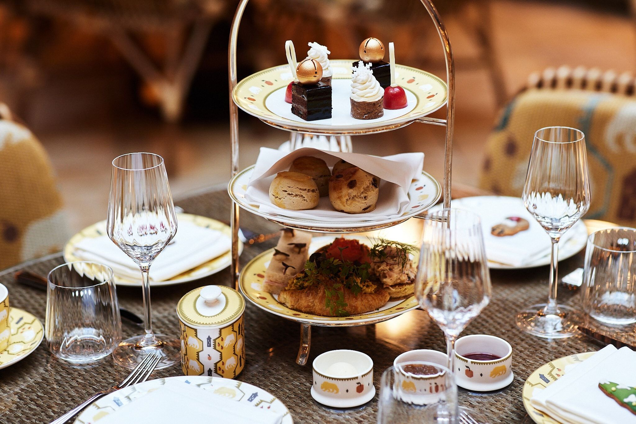Various dessert on a table set for dining.
