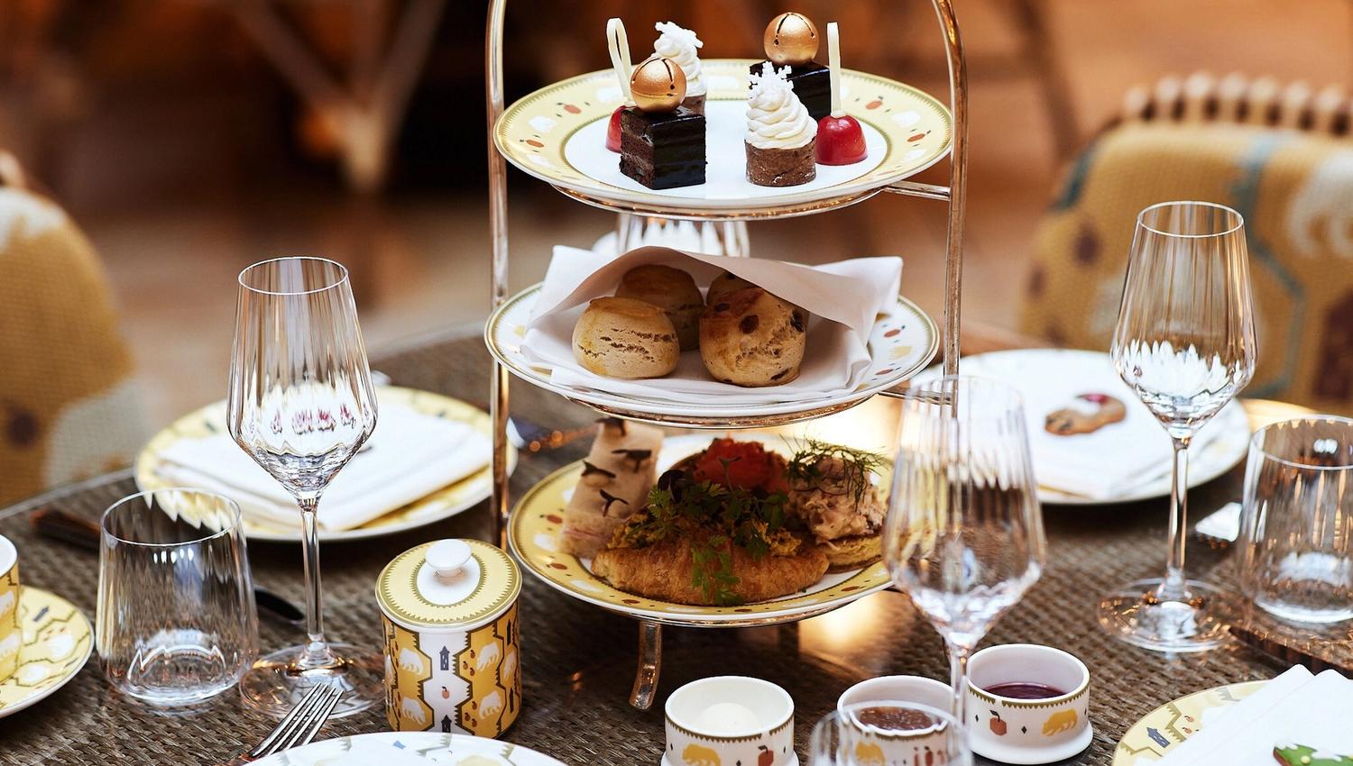 Various dessert on a table set for dining.