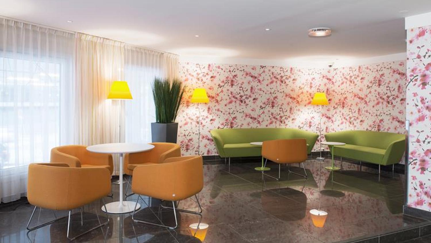 lounge area with sofas and seating
