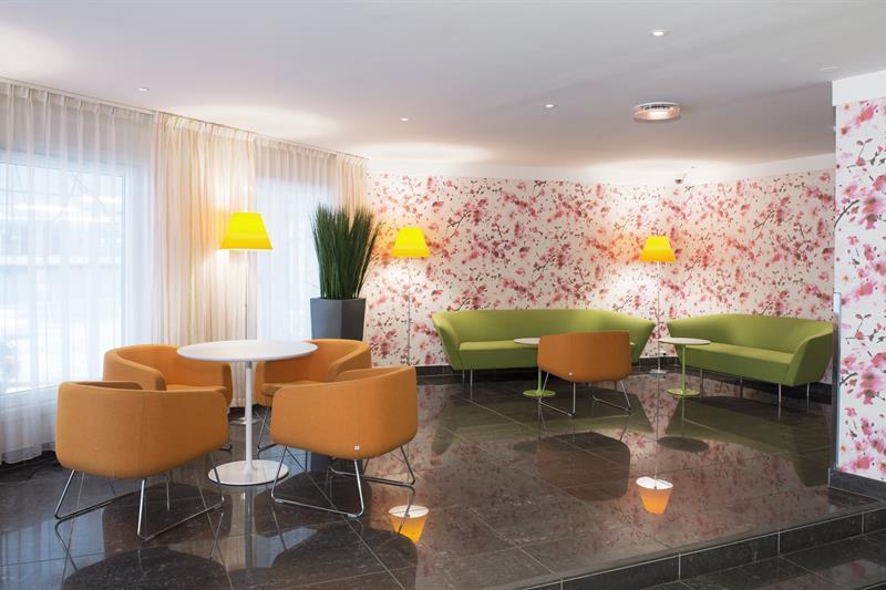 lounge area with sofas and seating