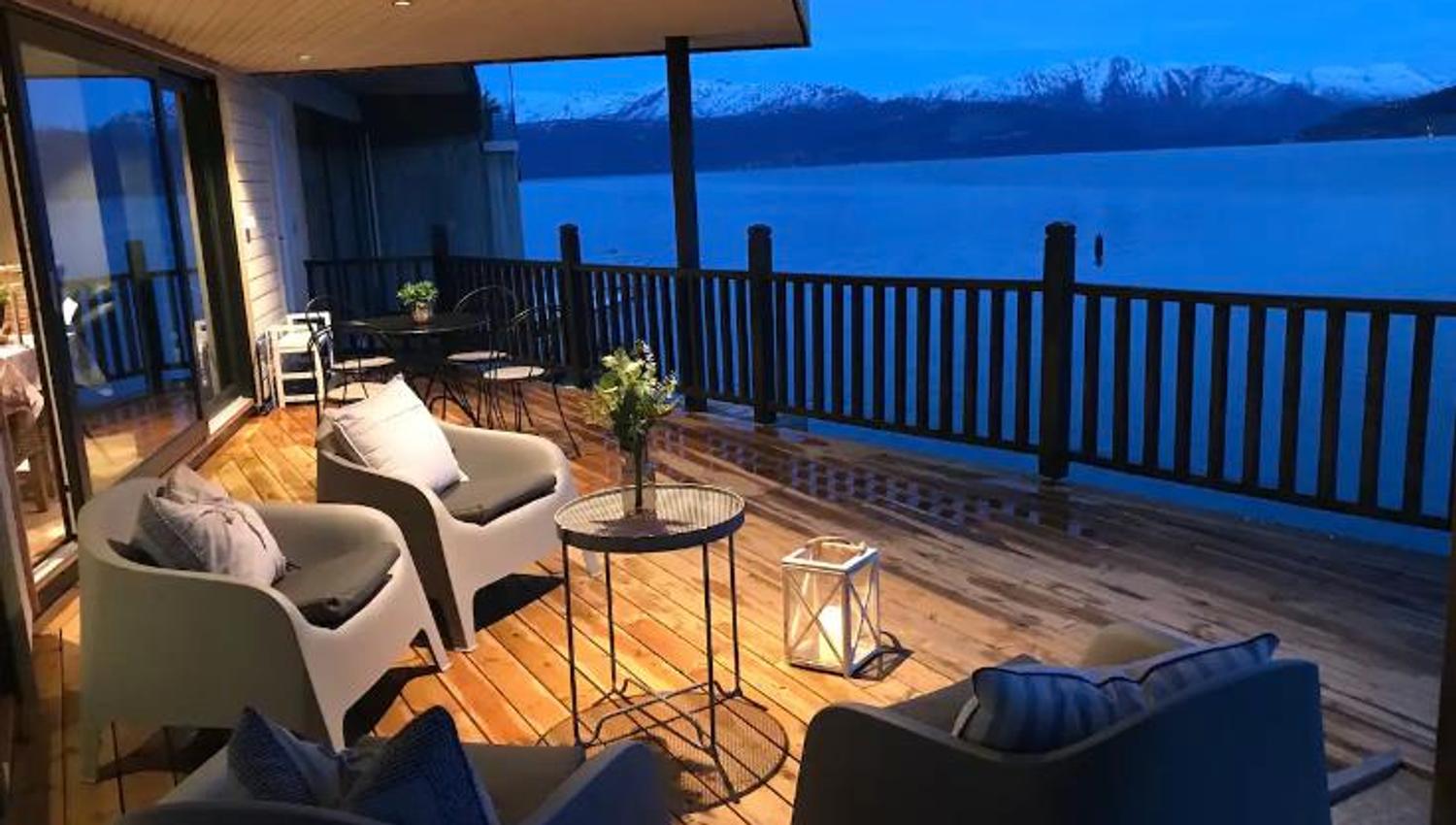 Evening ambiance on the beautiful terrace overlooking the Hardangerfjord. Perfect for peaceful nights surrounded by nature.