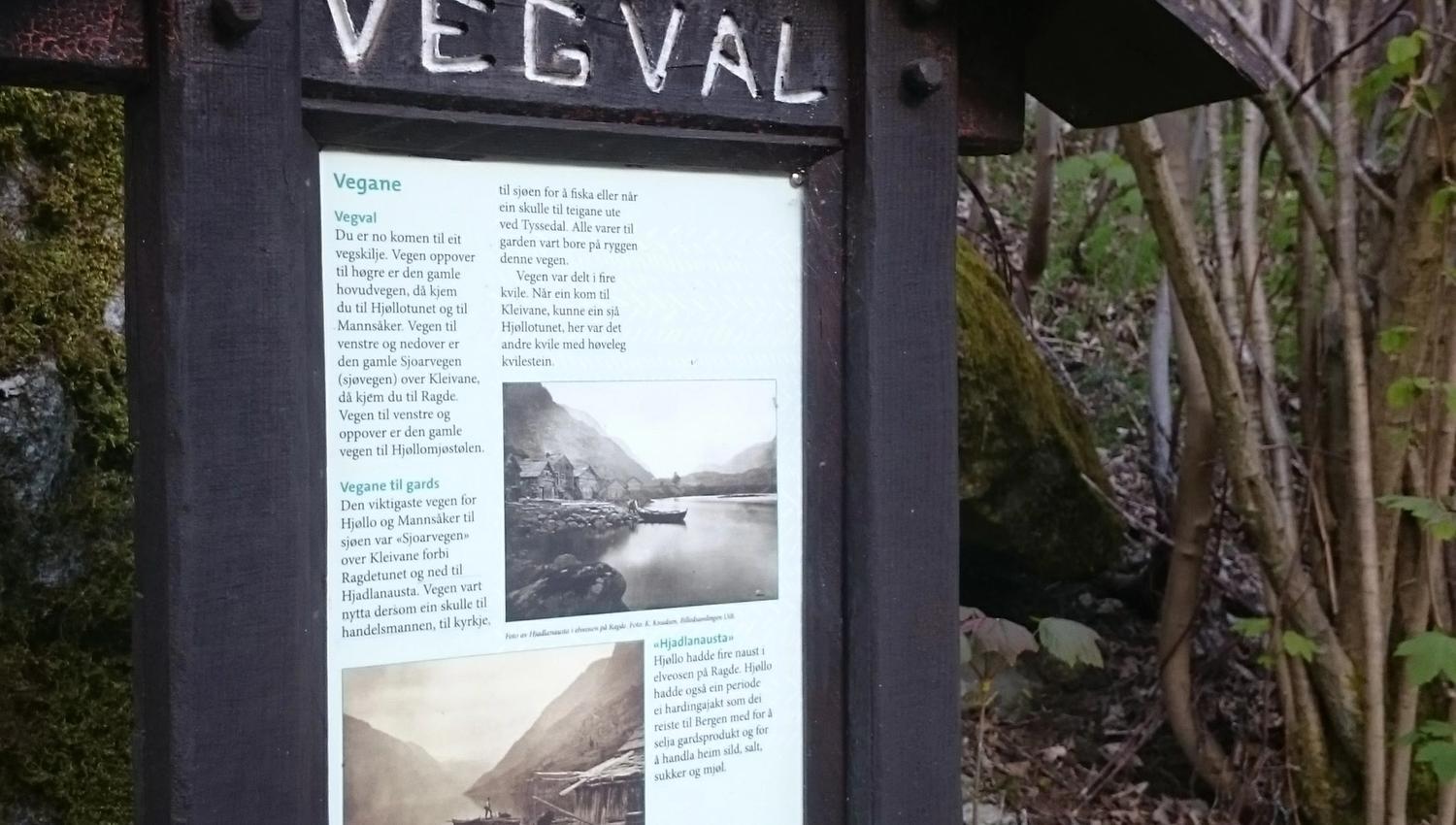 Information board “Vegval” along the Hjøllo–Mannsåker cultural trail, showing photos and stories about old travel routes.