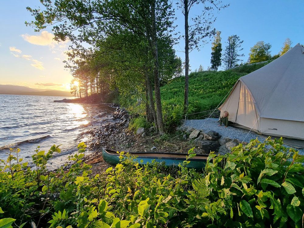 glamping tent at Bolkesjø Gard which is located right by the water