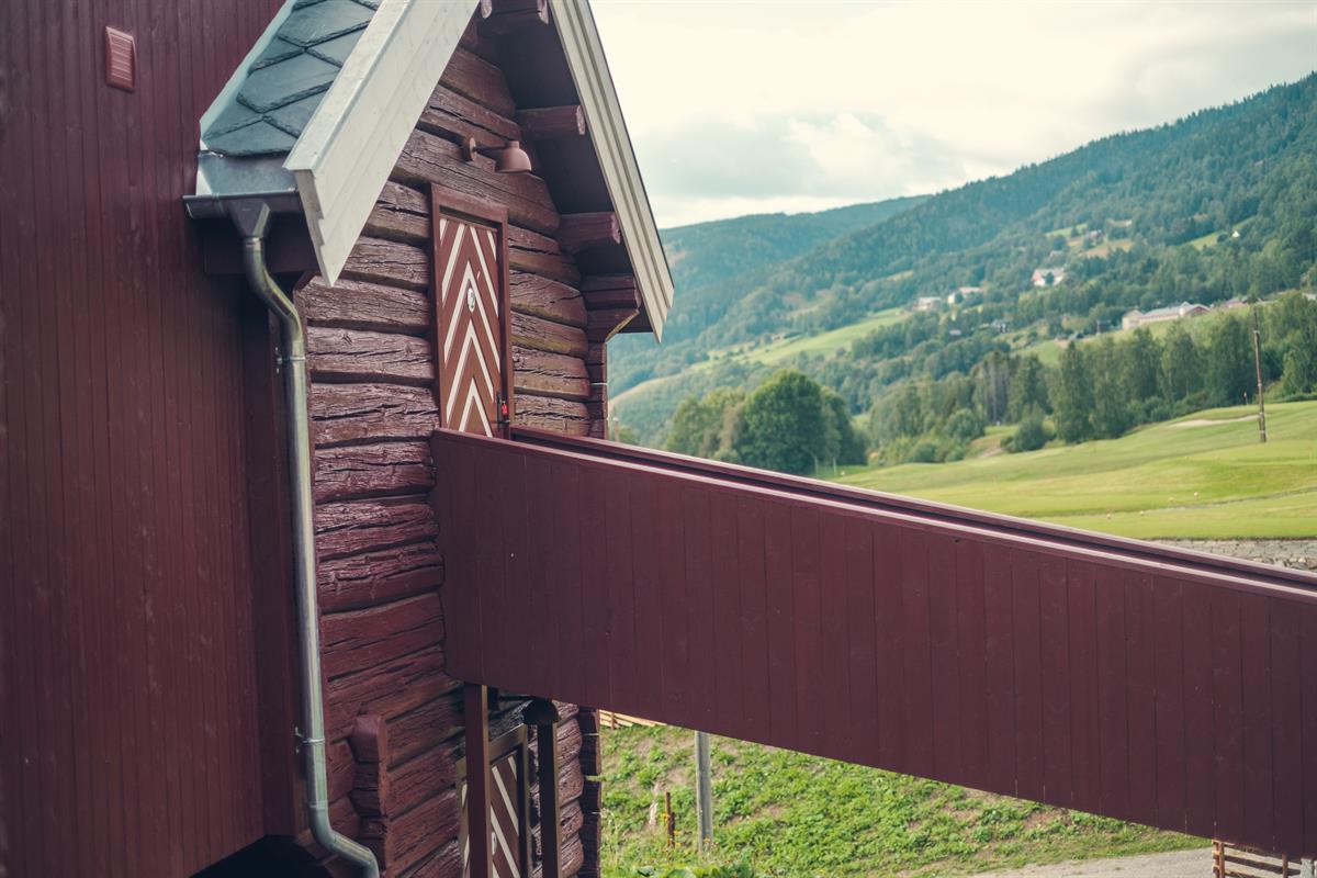 Detail of a balcony walkway on a traditional stabbur building.