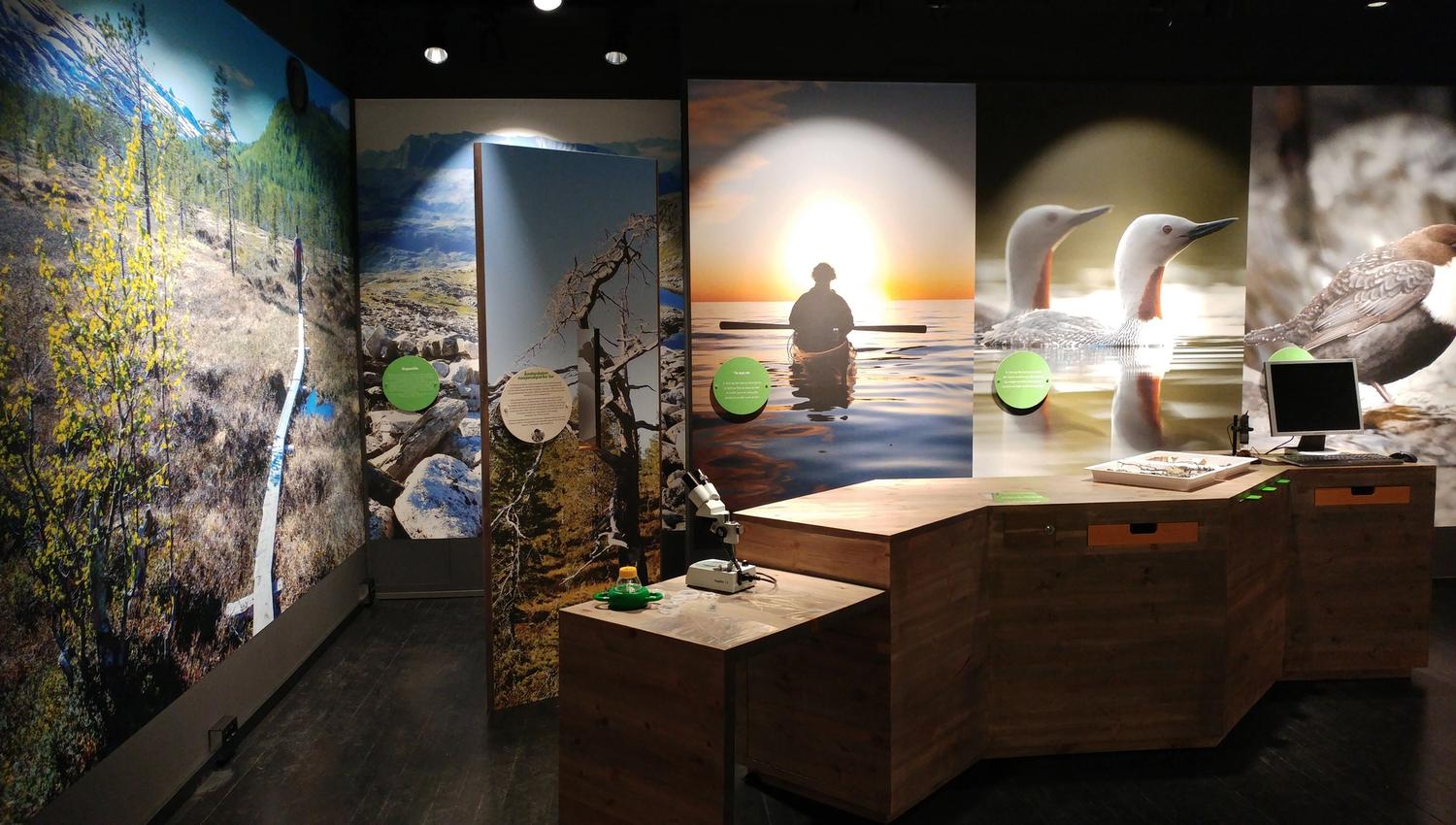 inside the museum, with various nature pictures