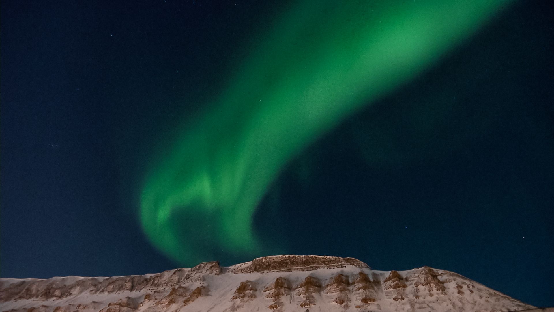 Northern lights above the mountain 