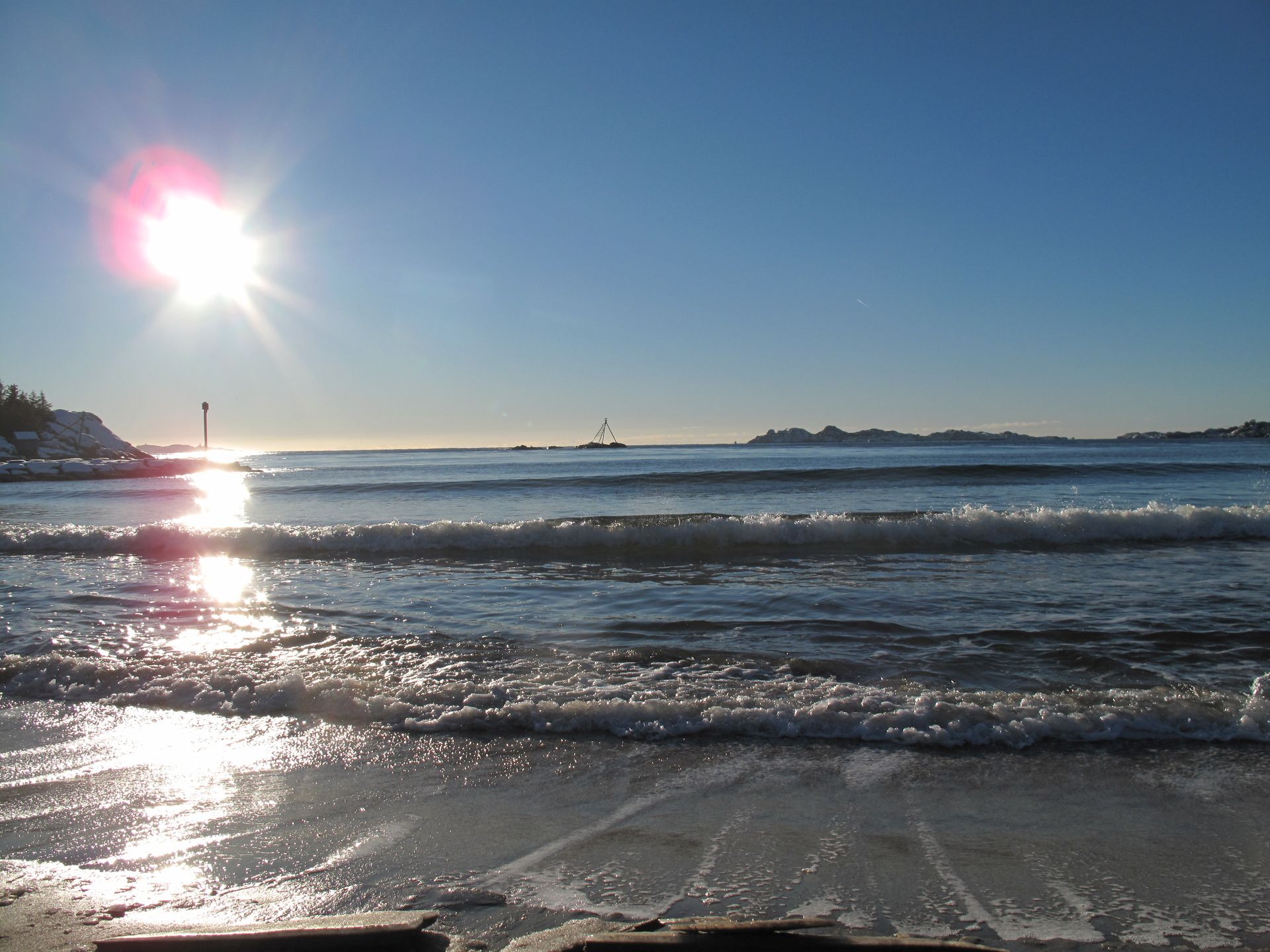 Waves lapping on the Sjøsanden beach.