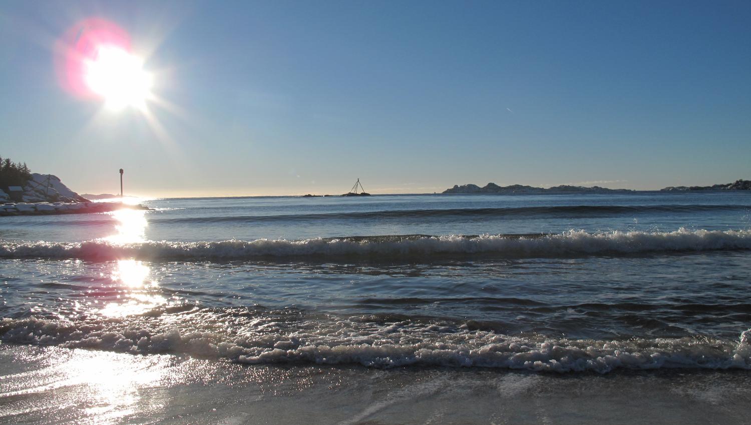 Waves lapping on the Sjøsanden beach.