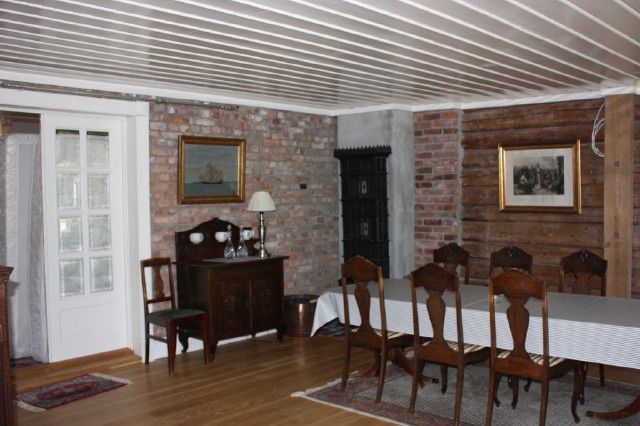 Livingroom with dining table in Havnegården