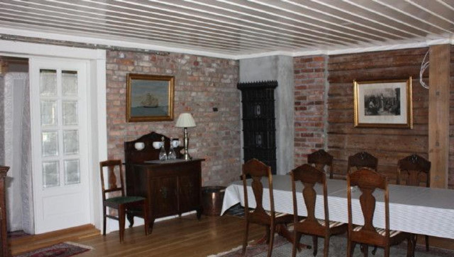Livingroom with dining table in Havnegården
