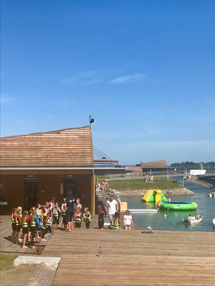 People by the water