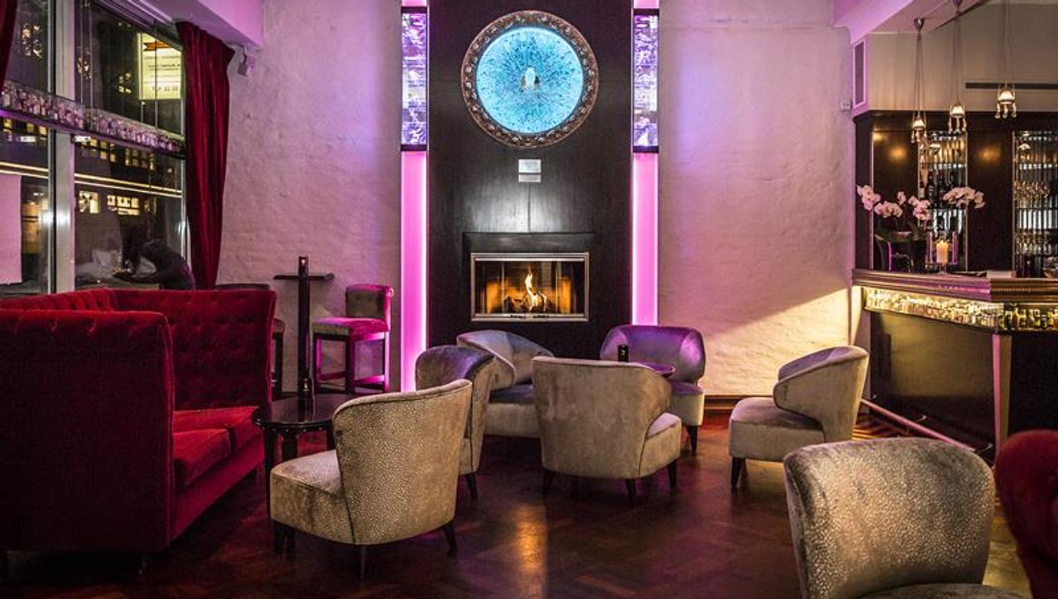 Room interior with bar, sofa and armchairs