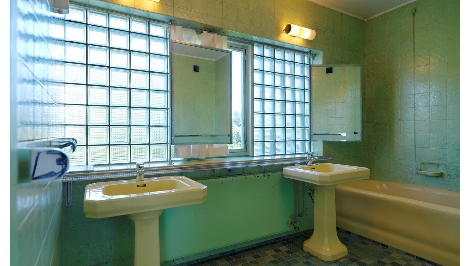 Green painted bathroom