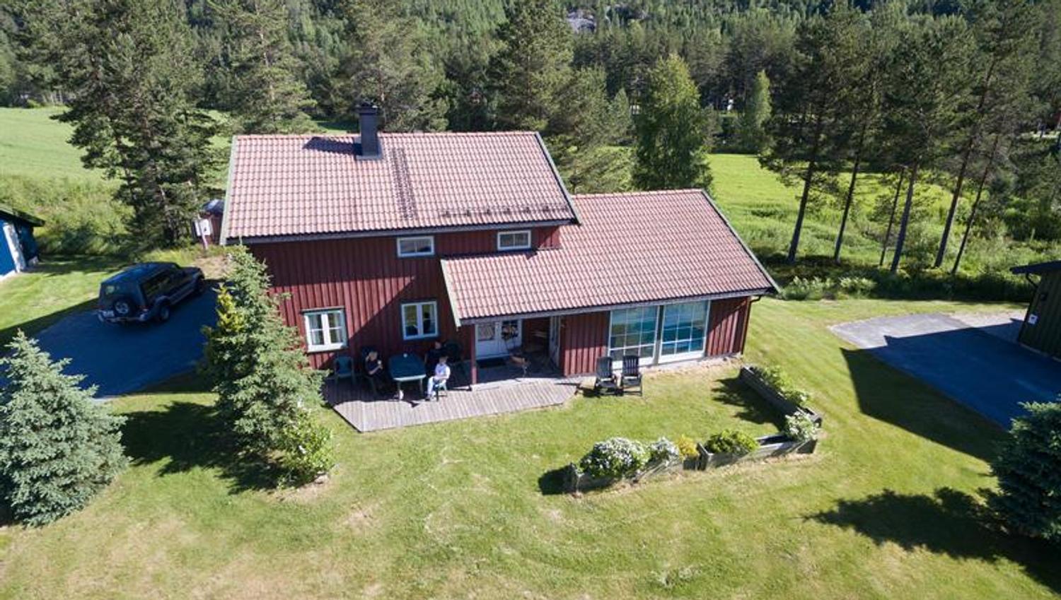 Rød hytte på Hillestad