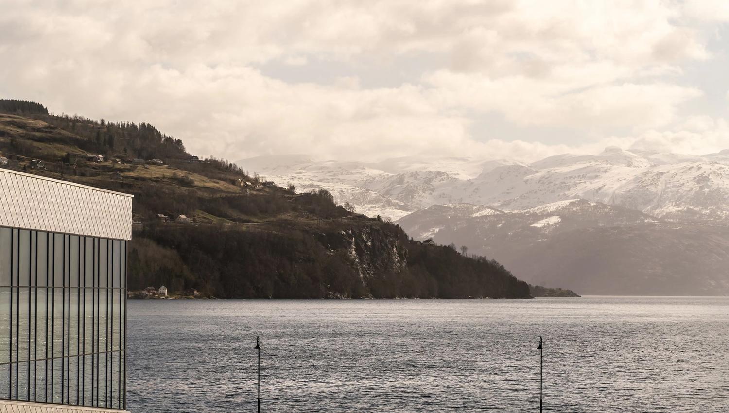Stunning view of the Hardangerfjord and snow-capped mountains from the hotel grounds.
