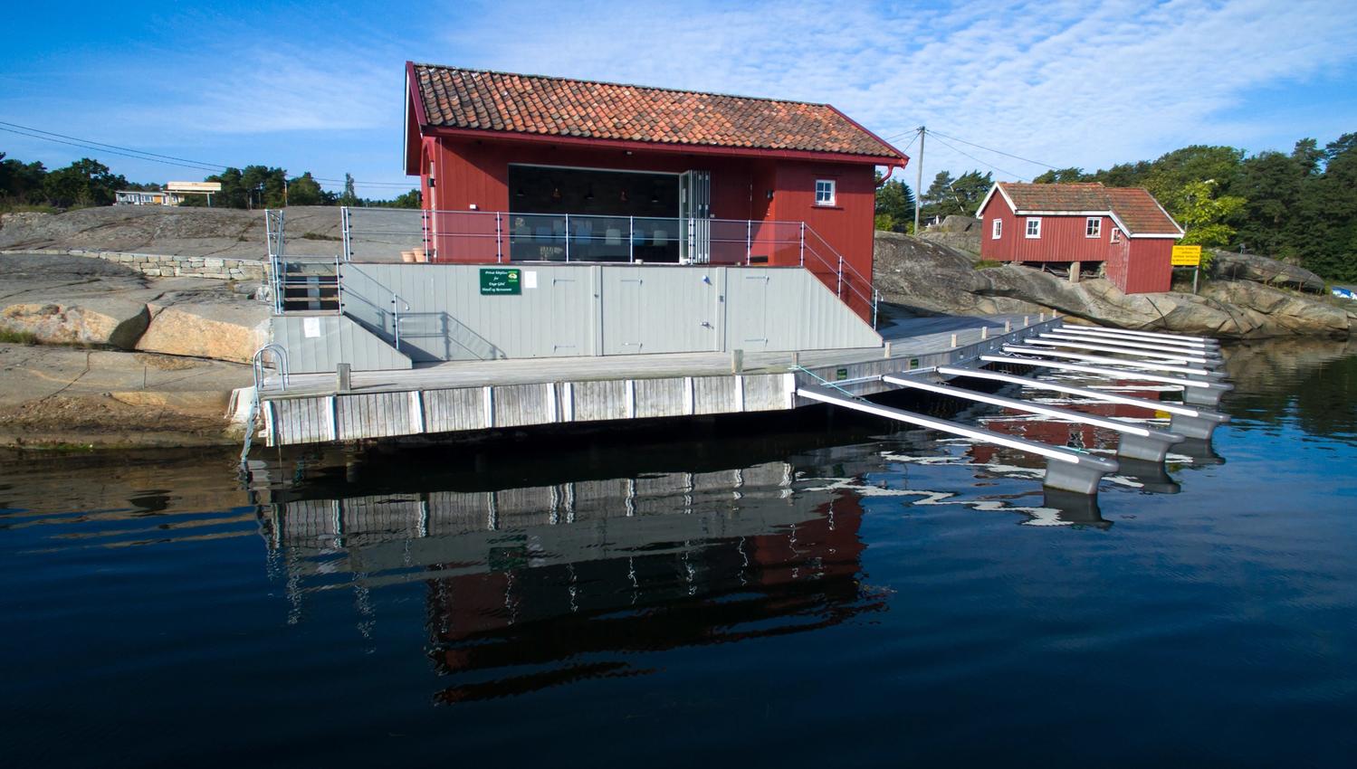 Sea shed by the water