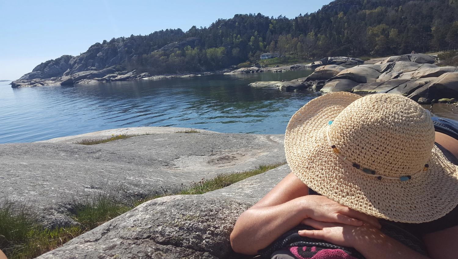 A sunbather by the sea