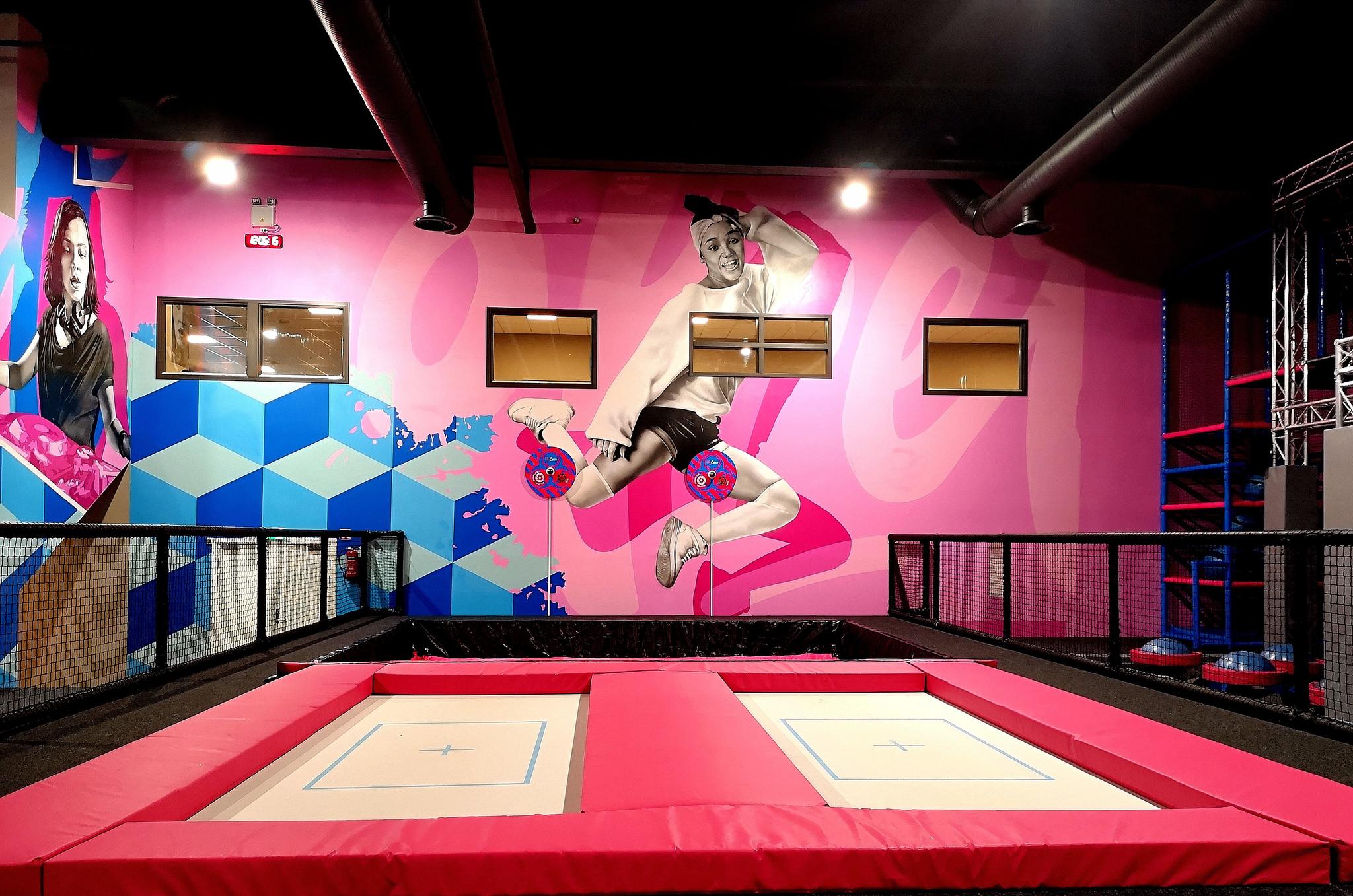 two trampolines in a trampoline barn