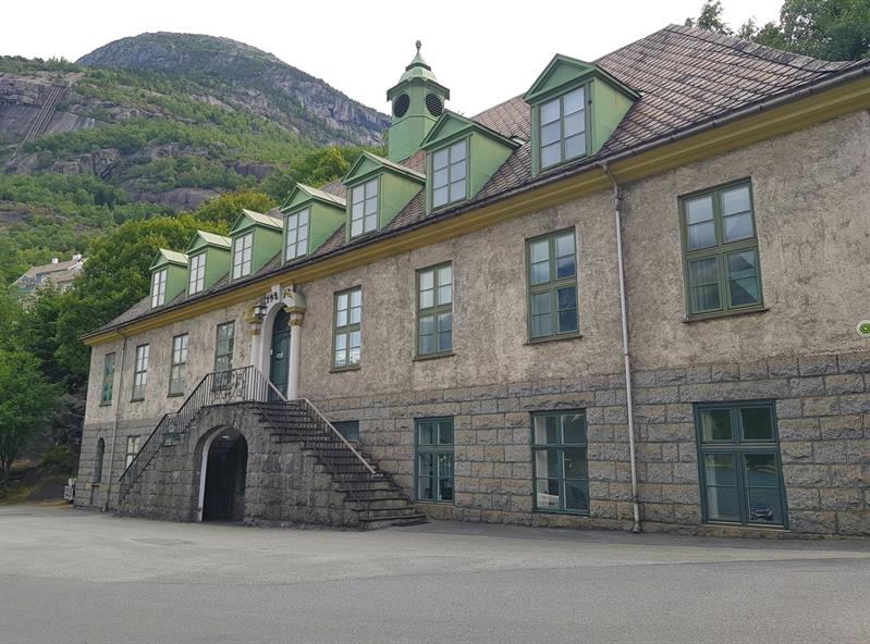 The facade of the main building at the Kraftmuseet, showcasing industrial-style architecture from the early 20th century.