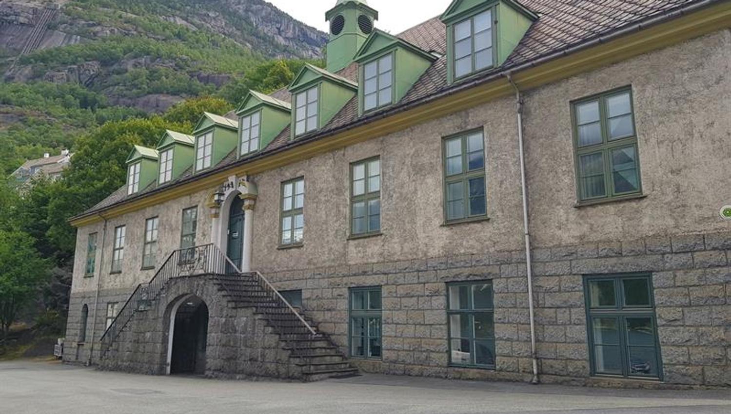 The facade of the main building at the Kraftmuseet, showcasing industrial-style architecture from the early 20th century.