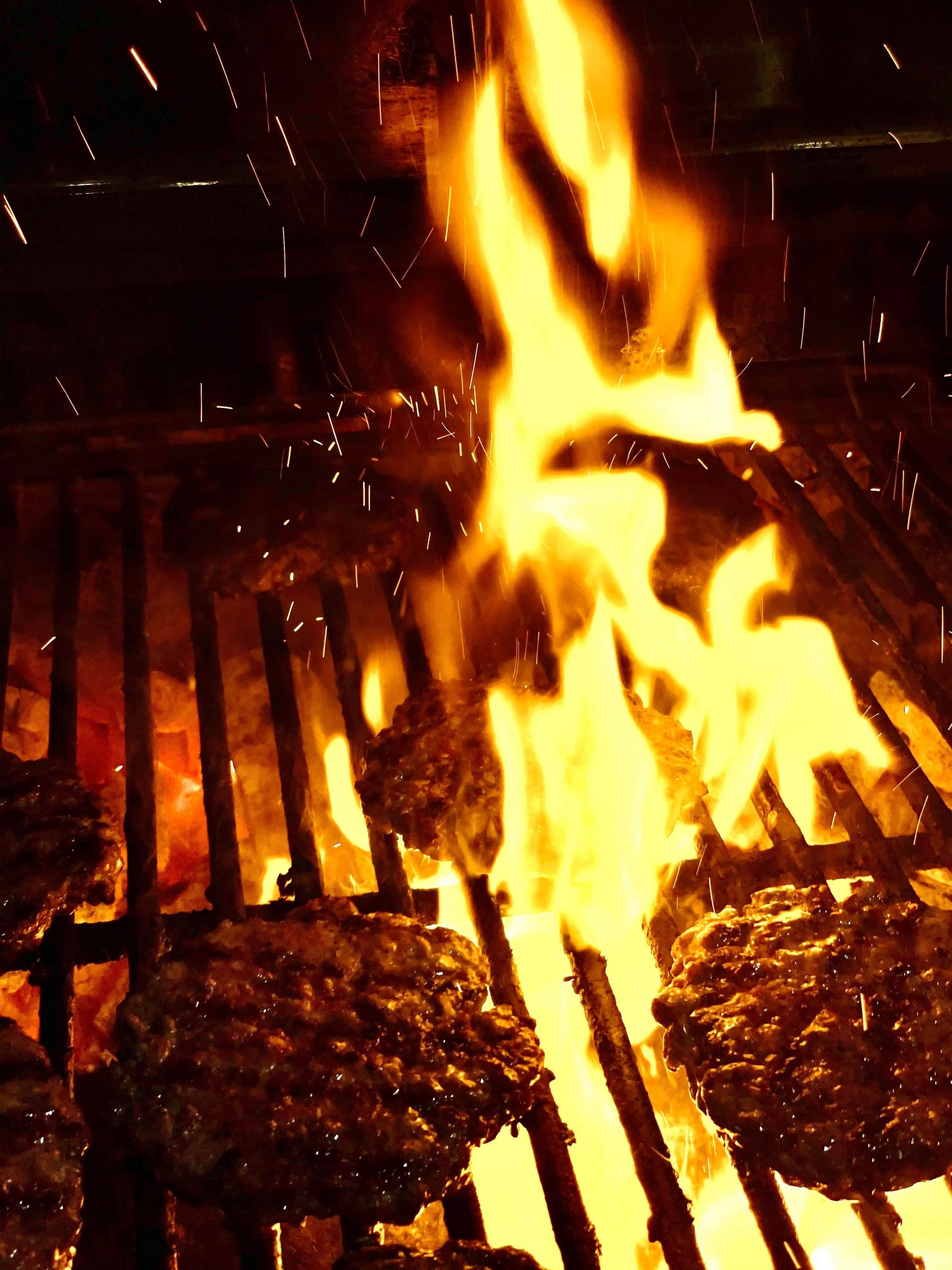 All their burgers are grilled over organic charcoal.