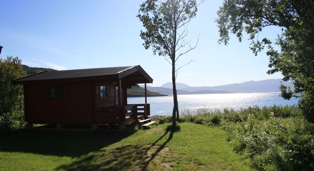 small cabin by the fjord.