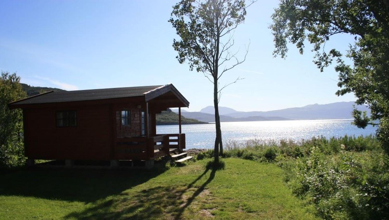 small cabin by the fjord.