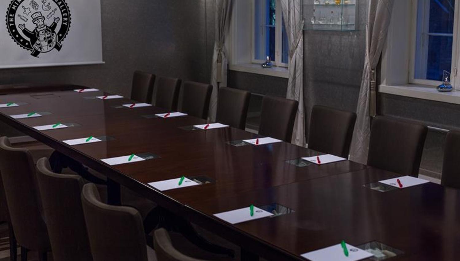 Boardroom with long table and chairs