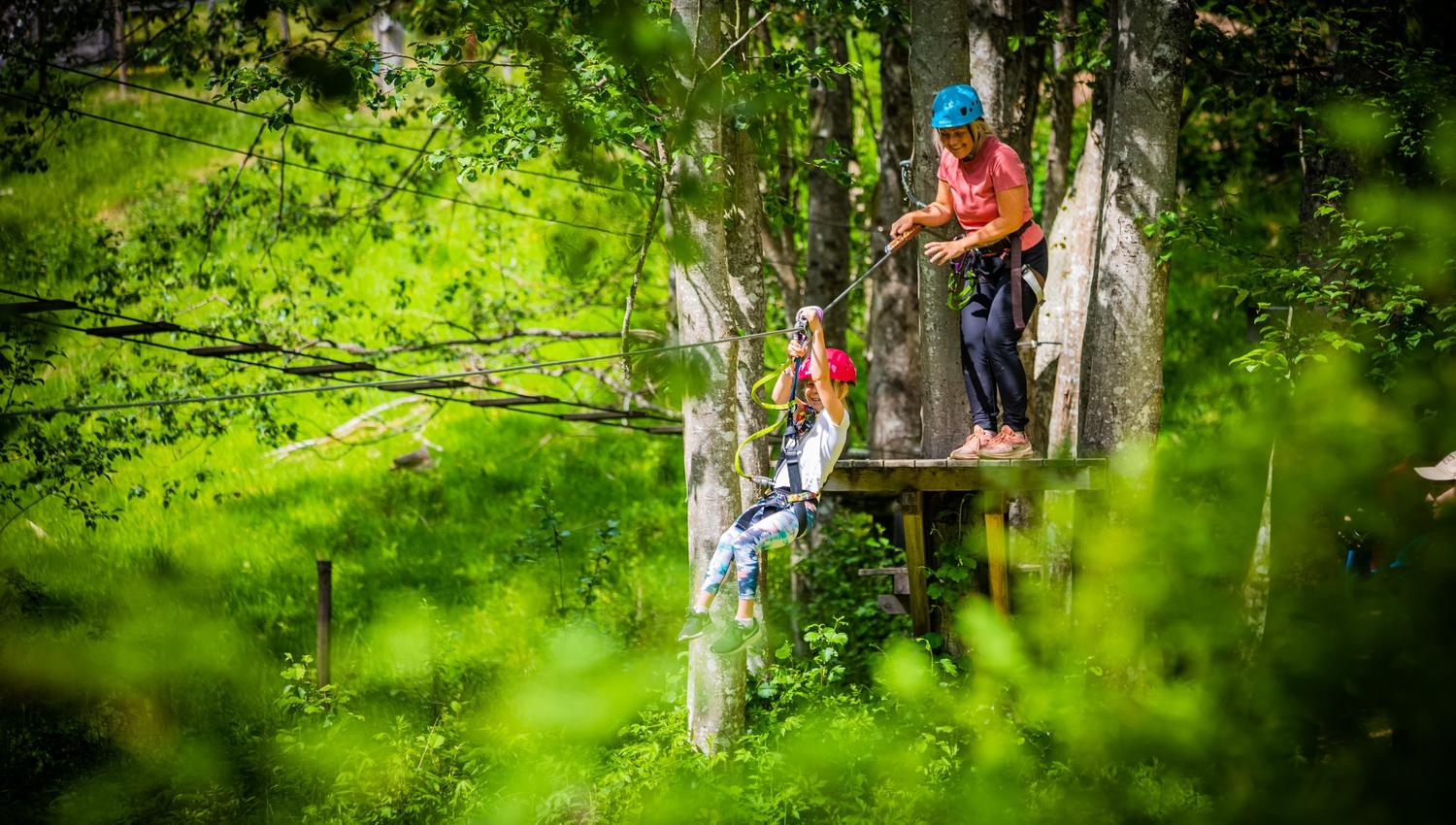 Two people climbing