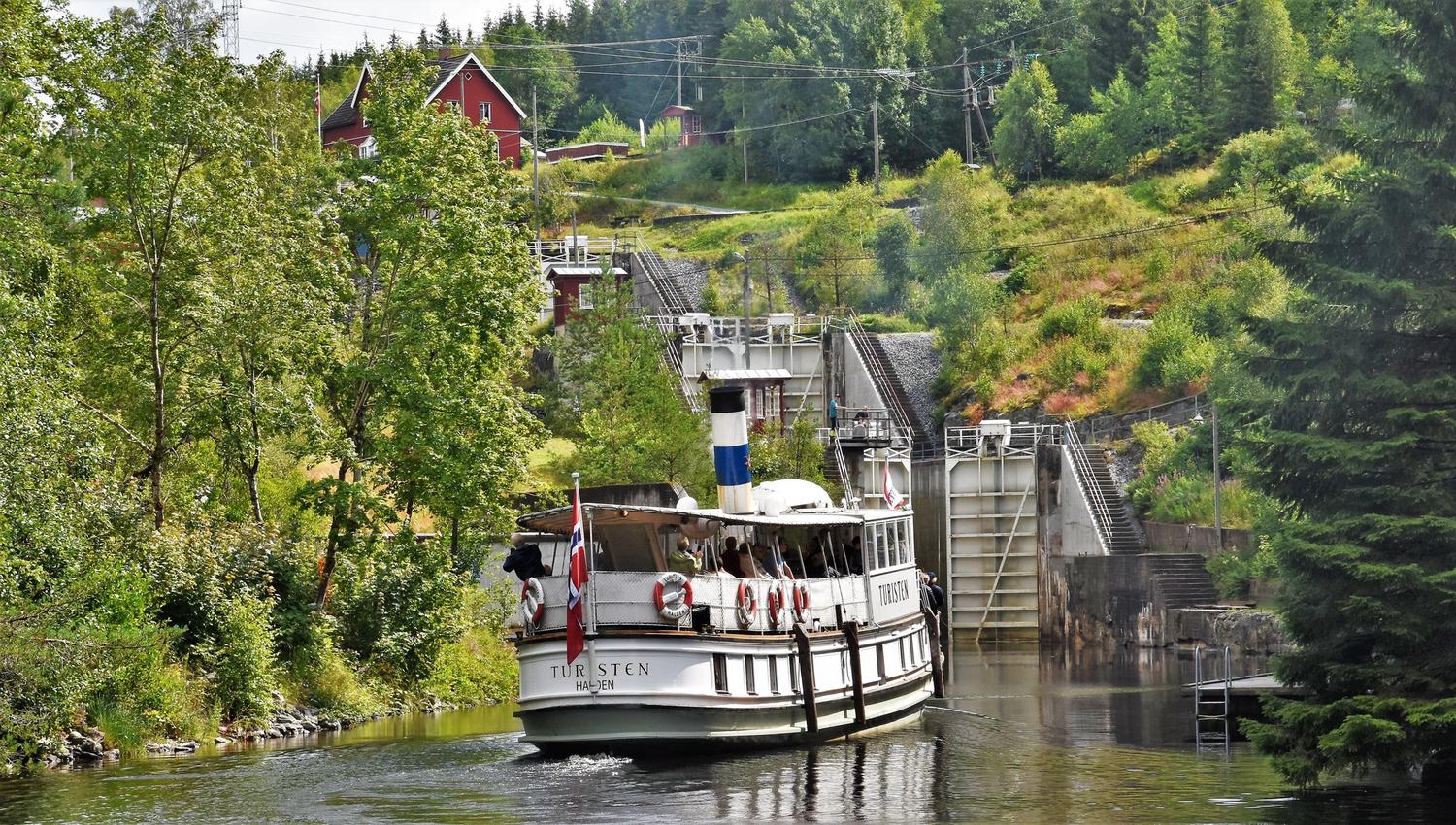 Steam boat in front of locks
