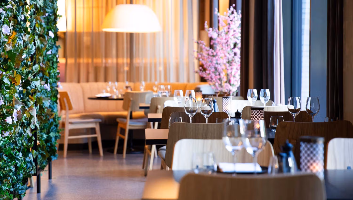Restaurant interior of tables set for dining and chairs