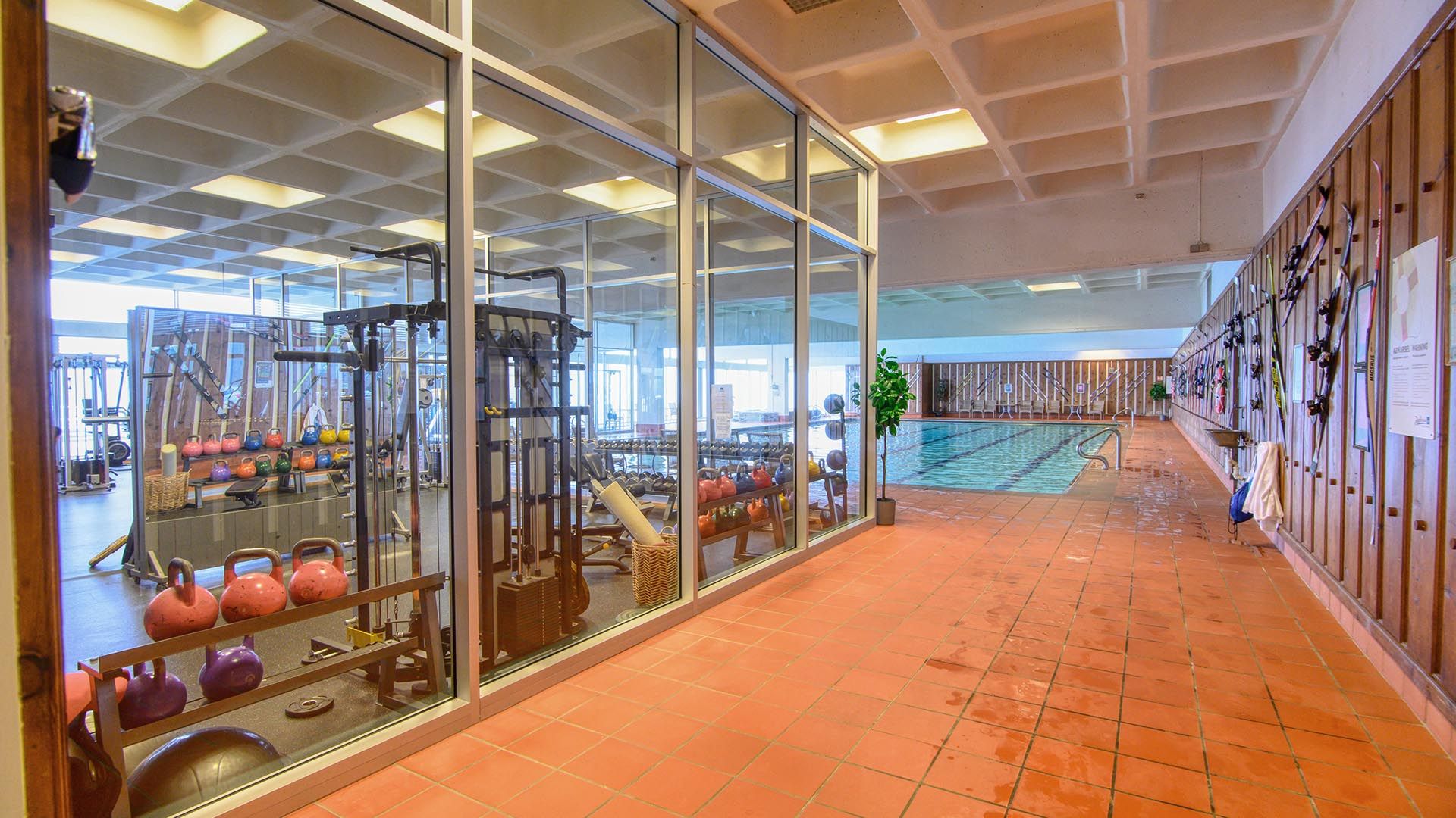 Gym with the swimming pool in the background,