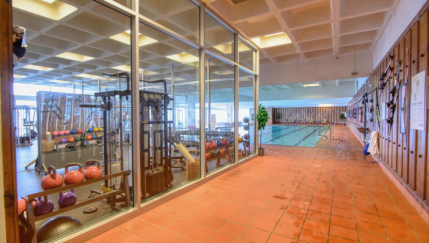 Gym with the swimming pool in the background,